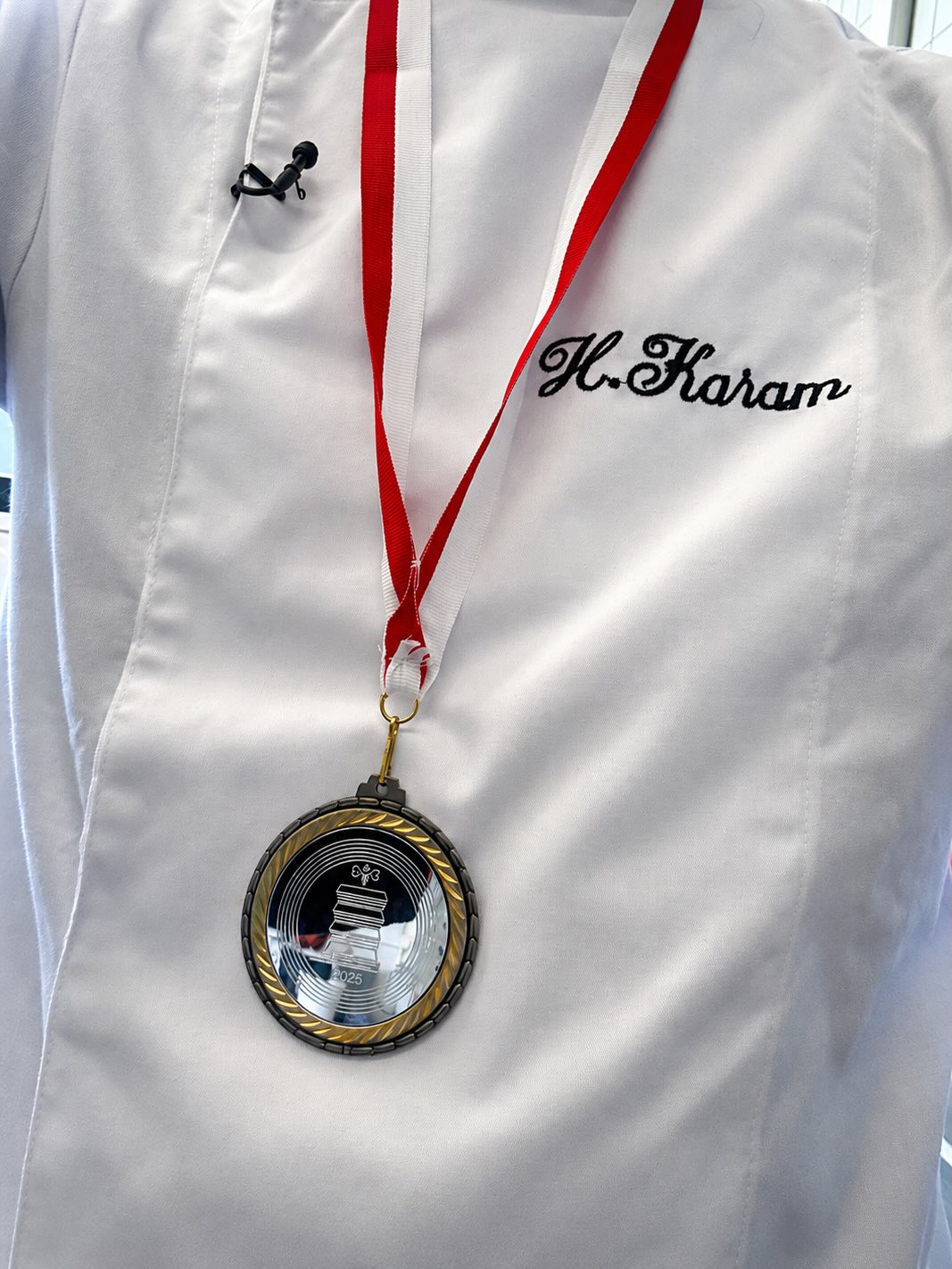 Embroidered chef jacket with the silver medal