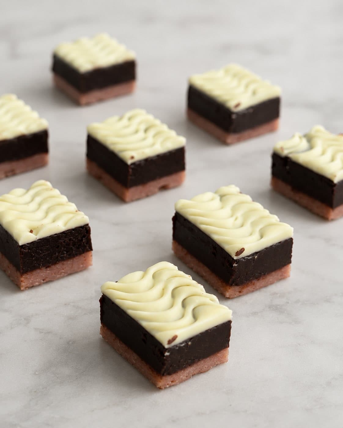 Layered petits gateaux with piped cream
