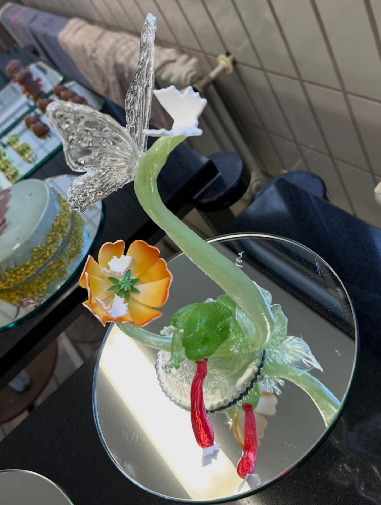 Sugar showpiece from an angle with flowers